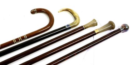 A 9ct Gold-Mounted Walking Stick, London 2010, with turned horn handle 110cm high A Walking Cane,