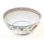 A Chinese Porcelain Bowl, Chenghua reign mark but 18th century, decorated in Wucai enamels with