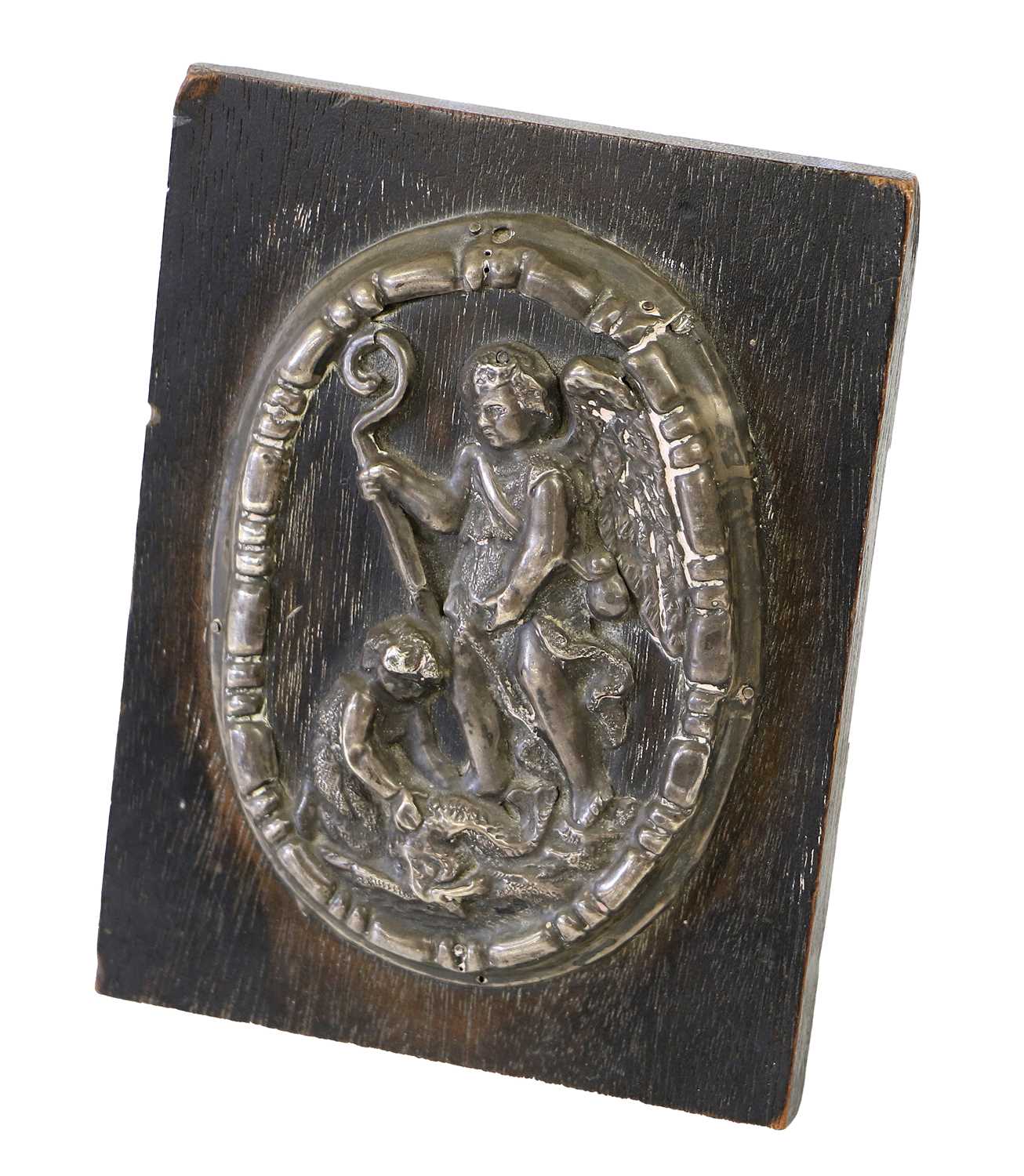 An Italian White Metal Plaque, 17th century, of oval form, worked in relief with Tobias and the