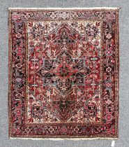 Heriz Rug of Unusual Size Iranian Azerbaijan, circa 1950 The claret field of angular vines