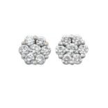 A Pair of 18 Carat White Gold Diamond Cluster Earrings the round brilliant cut diamonds in claw