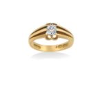 An 18 Carat Gold Diamond Solitaire Ring the old cut diamond in a yellow claw setting, to a grooved
