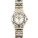 Tag Heuer: A Steel and Gold Calendar Centre Seconds Wristwatch, signed Tag Heuer, model: Link,