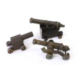 An Early 19th Century Bronze Small Signal Cannon, the 14.5cm triple ringed barrel with scroll to the