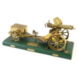 A Large Brass Model of a First World War Vickers Machine Gun, Carriage and Limber, the green painted