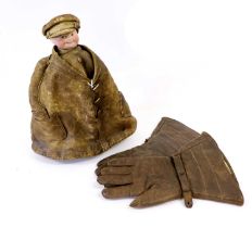 A First World War/Post-War Soldier Doll Tea Cosy, with bisque flange Kewpie type head, wearing a