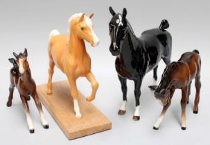 Beswick Horses Including, Hackney "Black Magic", model No. 1361, black gloss, Palomino on wooden