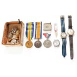 A First World War Pair, two commemorative medals, a lighter, three watches, a mother-of-pearl page