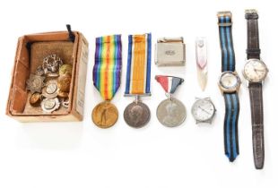 A First World War Pair, two commemorative medals, a lighter, three watches, a mother-of-pearl page