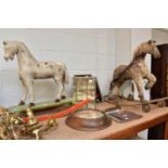 A Carved Pine Painted and Gesso Rocking Horse, a mid-20th century hide-mounted horse on a pull-along
