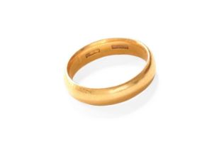 A Band Ring, stamped '22CT', finger size P1/2 Gross weight 8.5 grams.