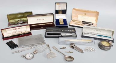 A Dunhill Silver Cigar Cutter, a Dunhill cigarette lighter, a silver cigarette case, a pair of