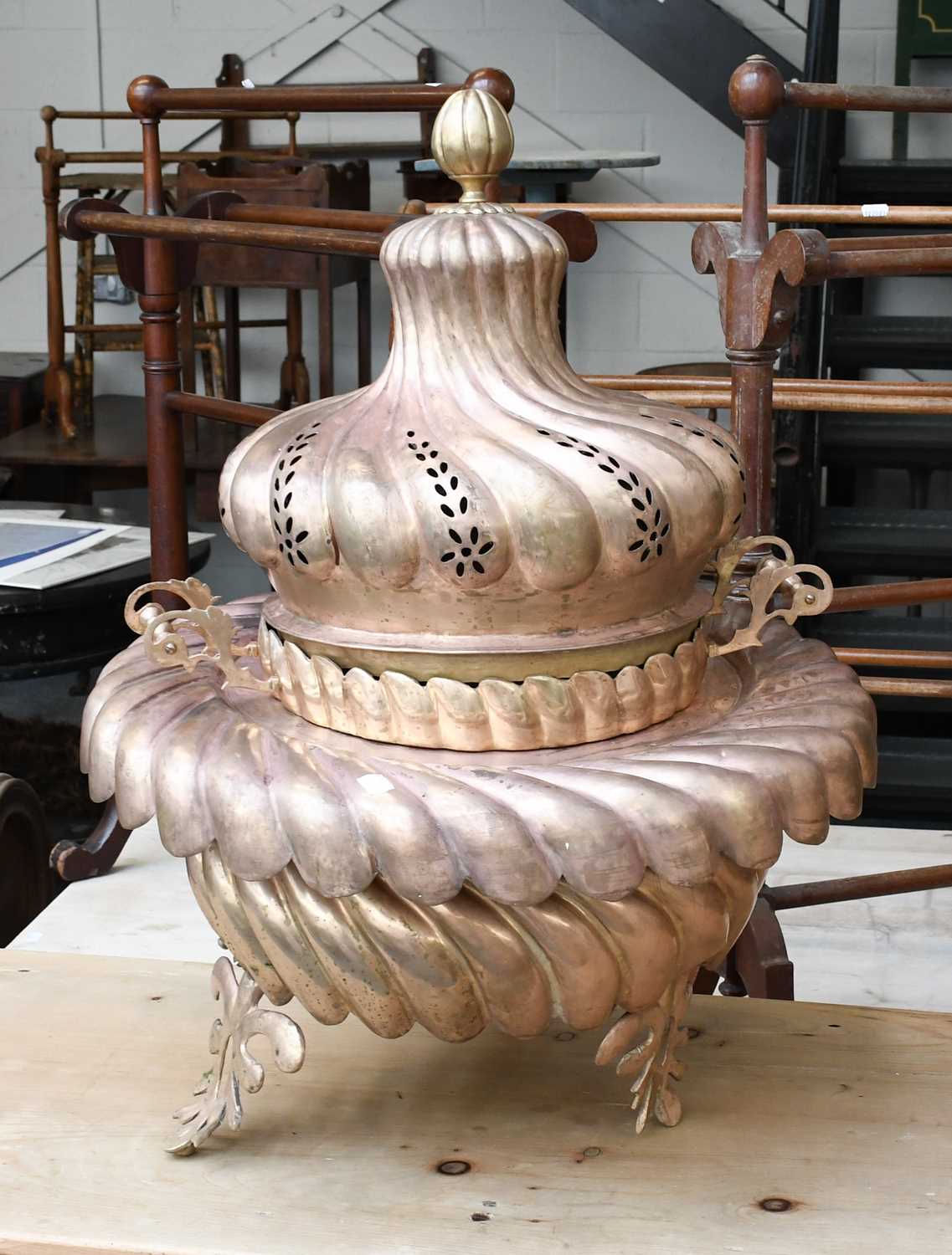 A 19th Century Style Pierced and Wrythen Metal Temple Censer, with twin handles and foliate feet,