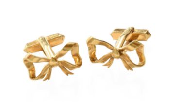A Pair of 18 Carat Gold Bow Motif Cufflinks, with swivel bars Gross weight 13.2 grams.