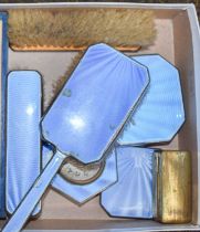 A Silver and Blue Enamel Dressing Table Set, comprising bed side clock and compact * glass kidney
