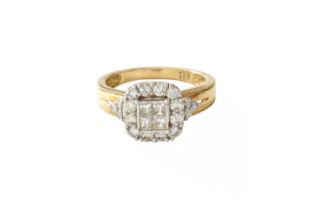 A 9 Carat Gold Diamond Cluster Ring, four princess cut diamonds within a border of round brilliant