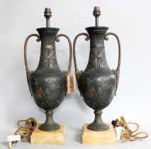 A Pair of Classical Style Patinated Metal Urn Form Table Lamps, on square section marble bases and