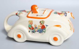An Art Deco Sadler Teapot, modelled as a racing car and printed with designs in the manner of