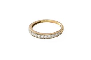 A 9 Carat Gold Diamond Half Hoop Ring, twelve round brilliant cut diamonds in white claw settings,