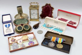 A Curio Lot, including silver and other Masonic medals, a French brass striking carriage clock, 14.