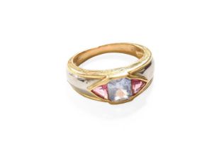 A Multi Gem-Set Ring, the emerald-cut synthetic sapphire flanked by trilliant cut synthetic