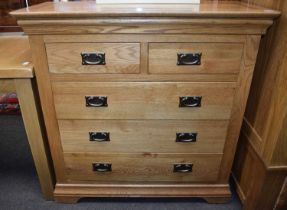 A Modern Oak Four Height Straight Front Chest of Drawers, 98cm by 44cm by 98cm together with a