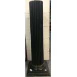 An Ebonised Fluted Column, on stepped square plinth base, 105cm high