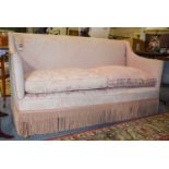 An Early 20th century Silk Upholstered Square Formed Sofa, with feather filled cushions on