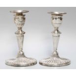 A Pair of Victorian Silver Candlesticks, by Jenkins and Timm, Sheffield, 1896, each on fluted oval