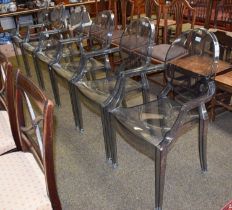 A Set of Six Ghost Style Chairs, smoke grey plastic, unmarked, each 92.5cm high