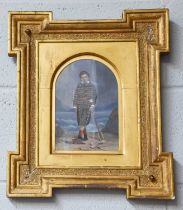 A Victorian Overpainted Photograph, portrait of a boy at the beach, in Kent type frame with arched