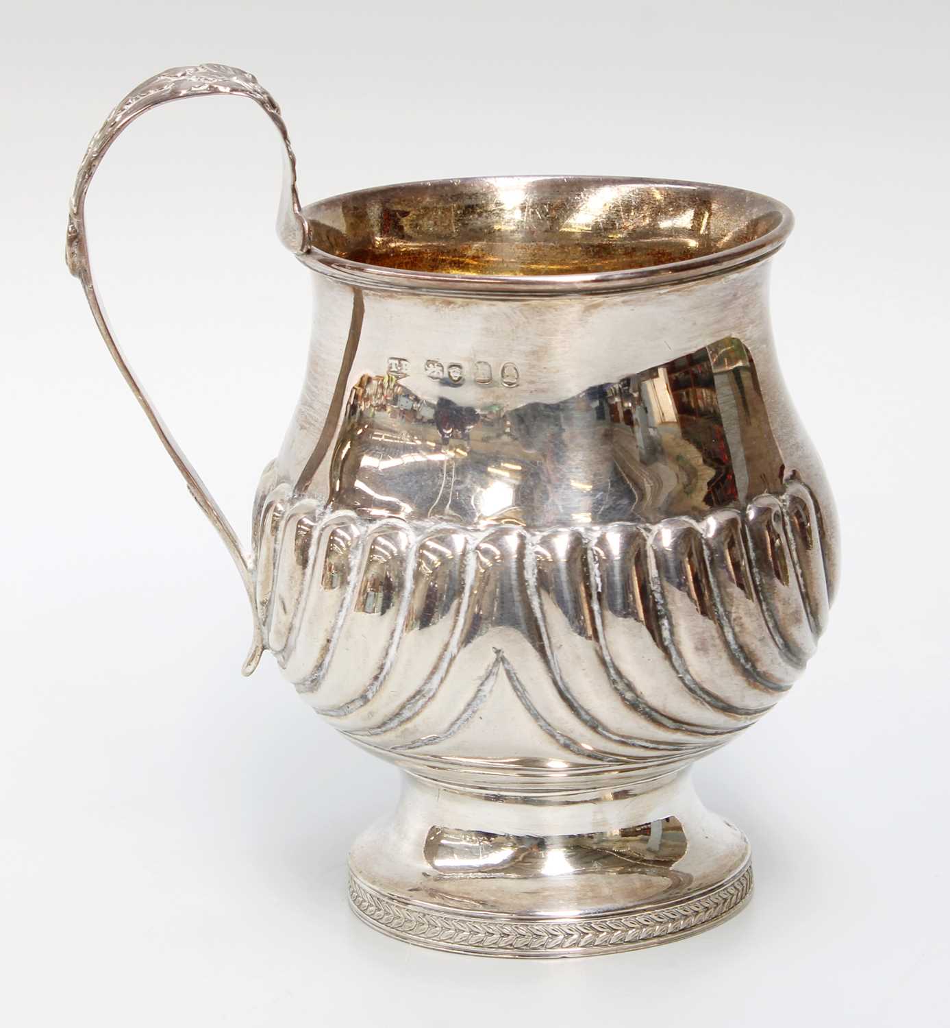 A George IV Silver Mug, Probably by Thomas Wilkes Barker, London, 1823, baluster and on spreading