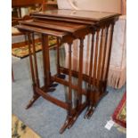 A Nest of Reproduction Mahogany Quartetto Tables, with cross-banding and spindle legs, 56cm by