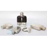 A Collection of Four Various Silver or Silver-Mounted Spirit-Flasks, variously shaped, one leather-