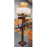 A Japanned 1920s Standard Lamp, with silk pegoda shade and on tapering square section pedestal,