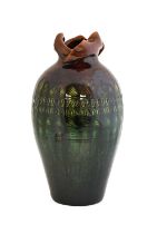 Christopher Dresser (Scottish, 1834-1904) for Linthorpe Pottery: A Vase, shape No.167, moulded
