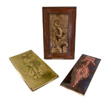 A Minton's China Works Tile, moulded with a classical maiden and three cupids, olive glaze,