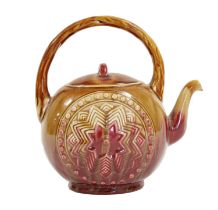 A Linthorpe Pottery Teapot, shape No.806, moulded with a repeating Aztec star designs to each