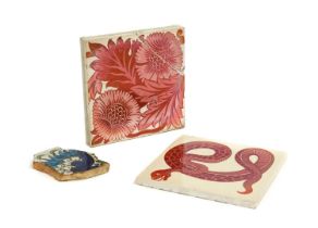 A William de Morgan 6" Red Lustre Tile, K.L Rose Chelsea, 15cm square (damaged and mounted) A 6" Red