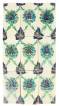 A Pilkington's 6" by 3" Persian Nine Tile Panel, circa 1907, in tones of blue and green, picked