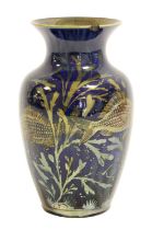 A Pilkington's Royal Lancastrian Vase, decorated by Richard Joyce, painted with four fish swimming