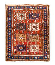 Kazak Rug Central Caucasus, circa 1880, the brick red field with eight polychrome panels