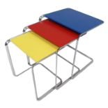 Tecta: Serie K3 Oblique Nesting Tables, blue, red and yellow lacquer, on bent tubular steel bases,