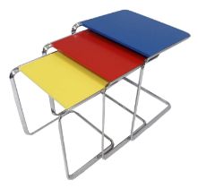 Tecta: Serie K3 Oblique Nesting Tables, blue, red and yellow lacquer, on bent tubular steel bases,