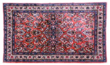 Saroukh Carpet West Iran, circa 1970 The salmon pink field with central medallion surrounded by