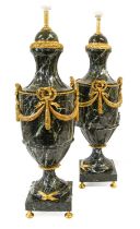 A Pair of Louis XVI Style Gilt Metal Mounted Veined Marble Lamp Bases, of urn form applied with
