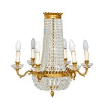 A Regency-Style Cut Glass and Gilt Metal Eight-Branch Chandelier, 20th century, of bag shape, the