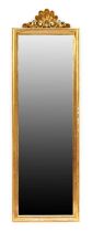 A Reproduction Rectangular Wall Mirror, the bevelled glass plate within a reeded frame surmounted