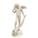 After the Antique: A White Marble Figure of a Winged Youth, standing holding a cornucopia, on a