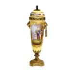 A Gilt Metal Mounted Sèvres-Style Vase, circa 1900, of slender baluster form, painted with